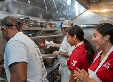 Photo of students in kitchen