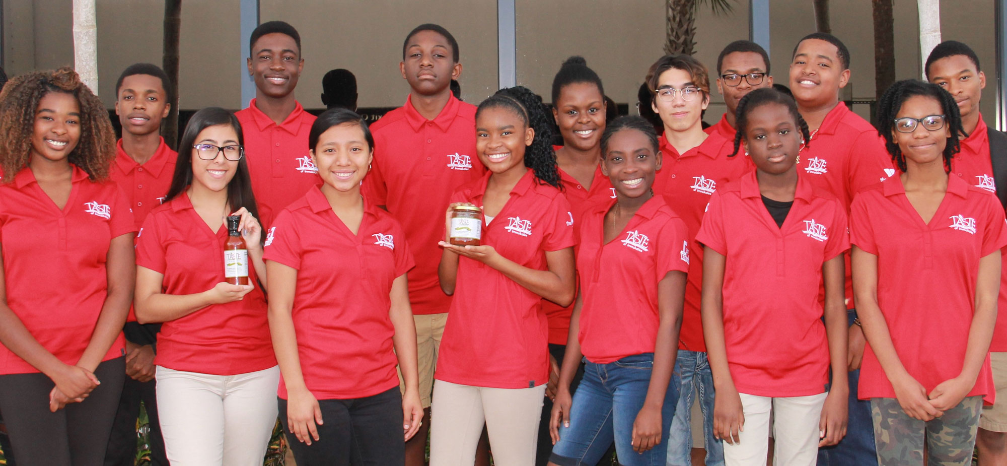 Photo of Students for Taste of Immokalee holding product