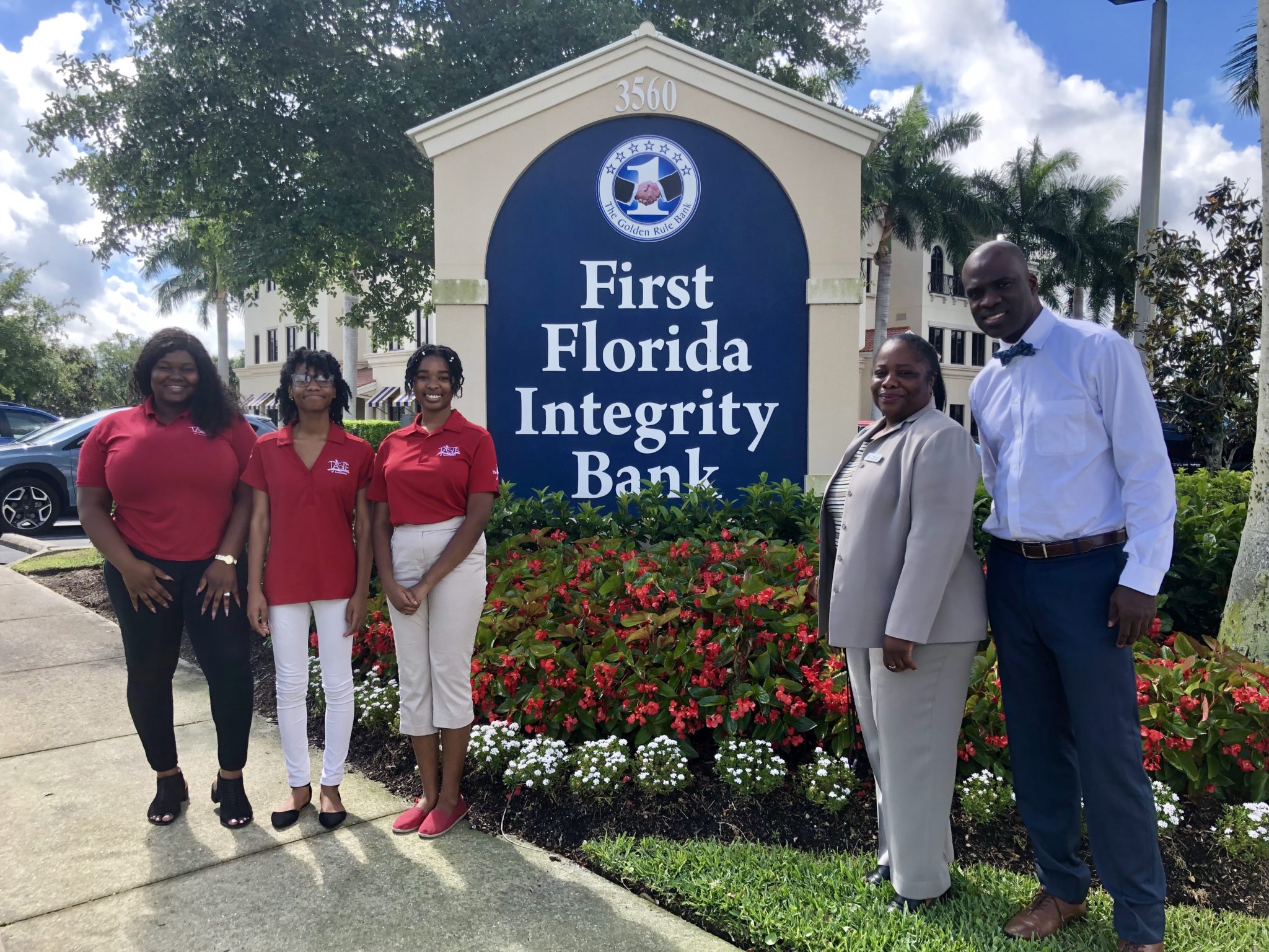 Team with First Florida Bank Sign